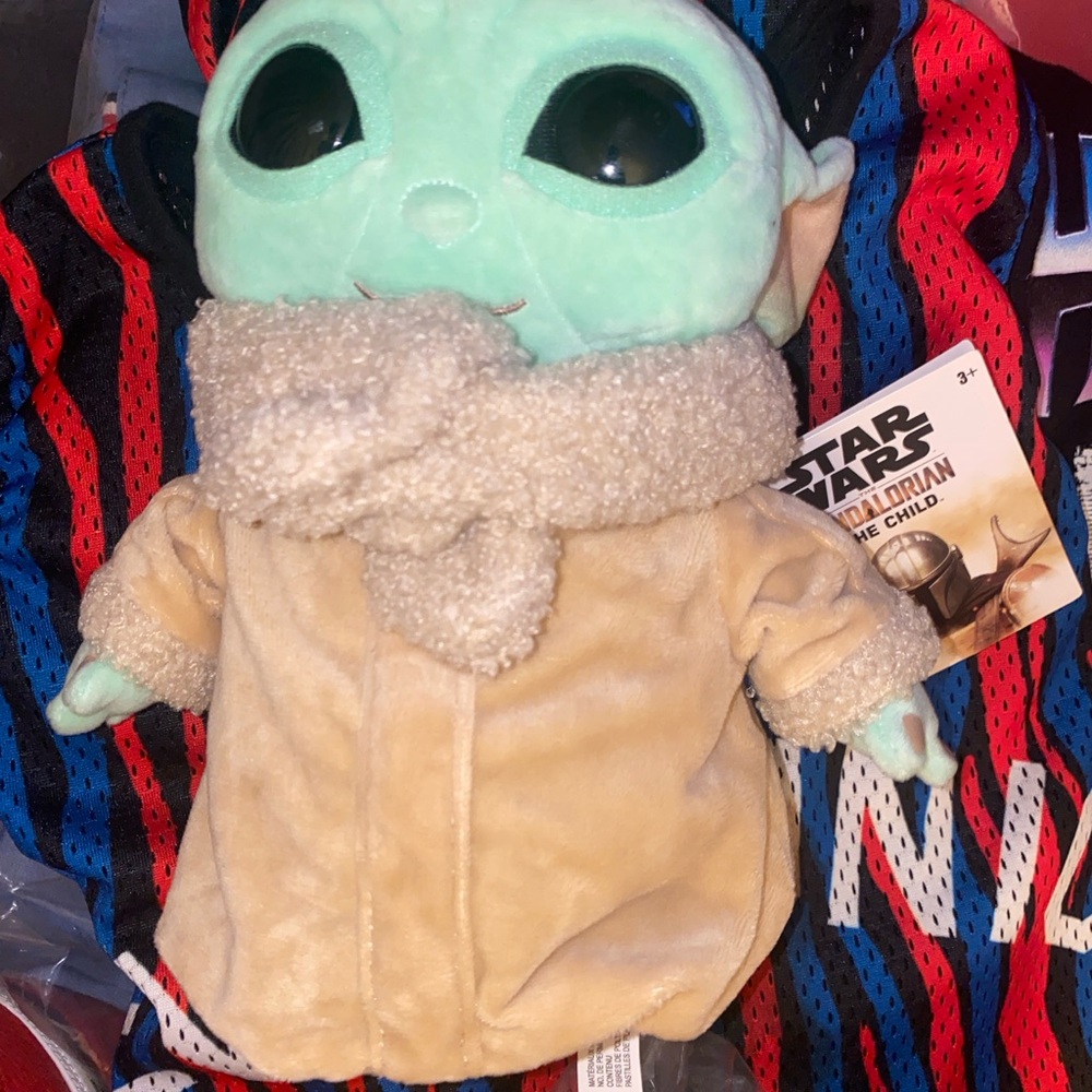 The Star Wars The Child Plush Toy is an 8-inch plush toy inspired by the Disney+